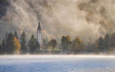 Church of Saint John the Baptist on a misty morning, Slovenia.